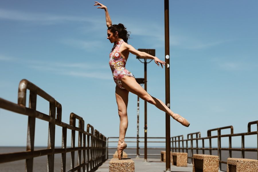 Kate Berk dancing on pier — graceful and powerful